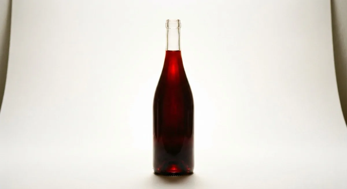 glass product photography - wine bottle with backlight technique